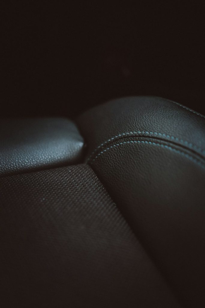 black-leather-textile-in-close-up-photography-oe4qhk9ews8